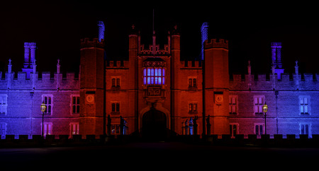 Illuminated Hampton Court Palace by night in Hampton Court, London, United Kingdomのeditorial素材