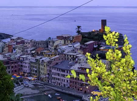 Dusk over Vernazza and Ligurian Sea in Vernazza, Cinque Terre, Liguria, Italyの写真素材