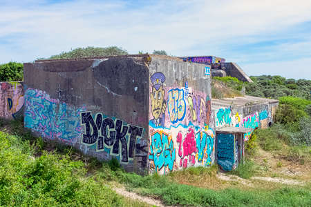 Dunkirk Beaches Bunkers with illegal graffiti - remains of a WW2 Nazi coastal gun battery, known as M.K.B Malo Terminusのeditorial素材