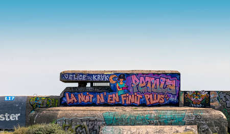 Dunkirk Beaches Bunkers with illegal graffiti - remains of a WW2 Nazi coastal gun battery, known as...