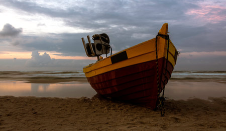 Fishing boat on Polish beach - Debki, Pomerania, Polandの写真素材