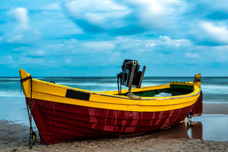 Fishing boat on Polish beach - Debki, Pomerania, Polandの写真素材