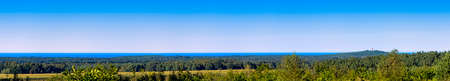 Panoramic view of Polish seacoast with lighthouse in background - Stilo, Pomerania, Polandの写真素材