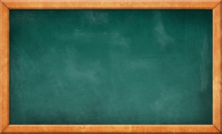 dirty scratched blank blackboardの写真素材