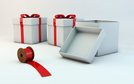 preparing Christmas gift boxes with red ribbonの写真素材