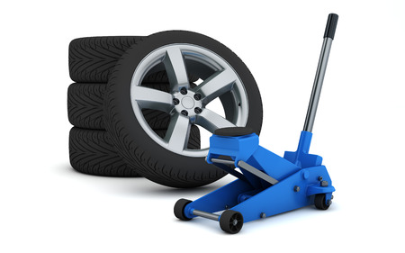 car jack and wheels isolated with clipping pathの写真素材