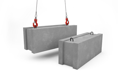 Concrete blocks for construction lifted up with crane isolated on white with clipping pathの写真素材