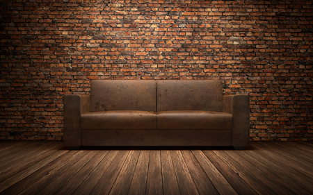Old leather sofa in empty room with brich wall. 3d renderingの写真素材