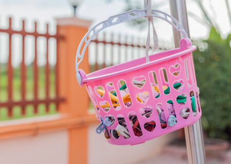 plastic cloth pin in the basketの写真素材