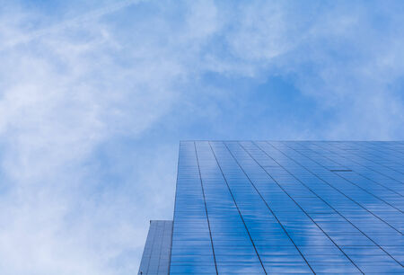 skyscraper office building with blue sky
