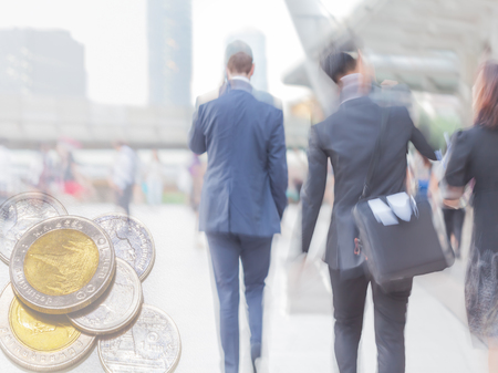 motion blur business people with finance backgroundの写真素材