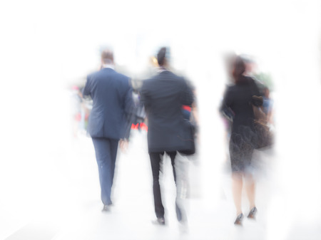 motion blur business people in business areaの写真素材
