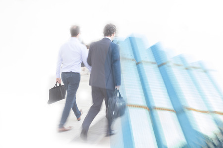 motion blur businessman traveling to workの写真素材