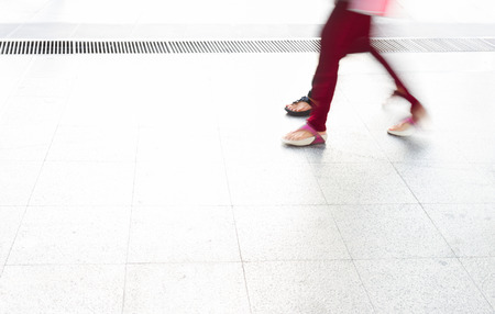 motion blur womwen walking backgroundの写真素材