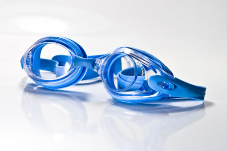 Reflective swimming goggles. White Background.の写真素材