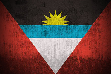 Weathered Flag Of Antigua and Barbuda, fabric texturedの写真素材