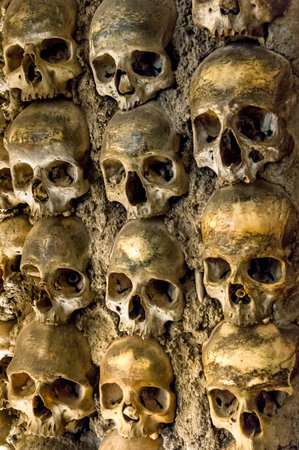 Wall full of skulls and bones in the bone chapel in Evora, Portugalの写真素材
