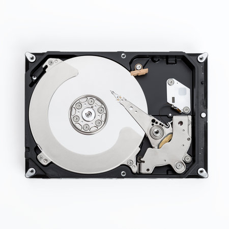 Close up view of a computer hard drive isolated on a white background.