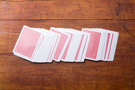 deck of cards on wooden table.の写真素材