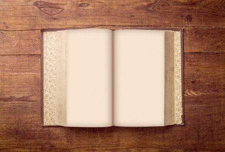 Open Book blank on old wood background.