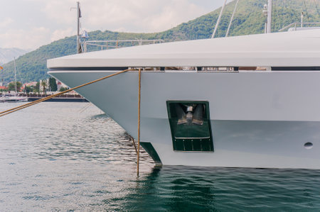 Yacht and anchor in marinaの写真素材