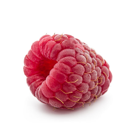 Extreme macro of red raspberry on white background.の写真素材