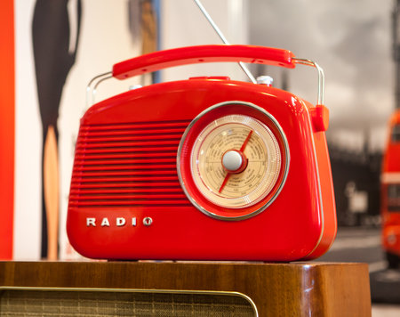 red retro radio on light background.の写真素材