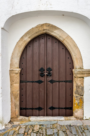 Old door in the city of Lisbon, Portugalの写真素材