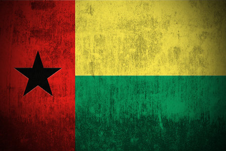 Weathered Flag Of Guinea-Bissau, fabric texturedの写真素材