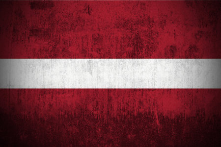 Weathered Flag Of Latvia, fabric texturedの写真素材