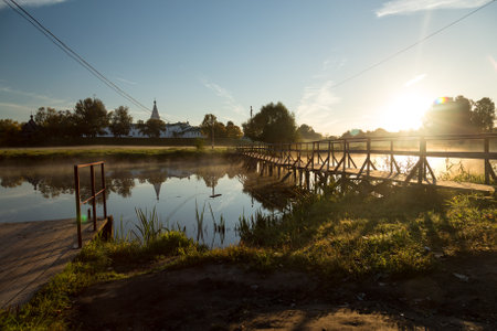 misty summer morning on the river.の写真素材