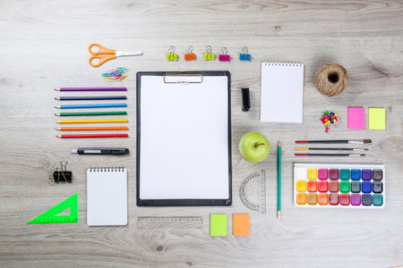 school supplies with pencils, paint pens paper scissors and rulers.の写真素材