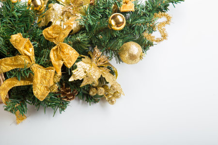 Tree branches with golden baubles stars snowflakes.の写真素材