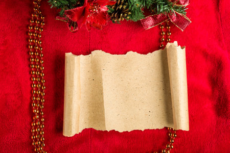 Christmas vintage scroll on red background.の写真素材