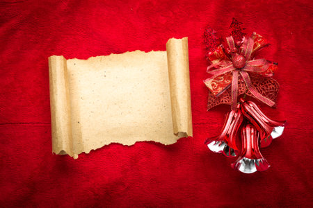 Christmas vintage scroll on red background.の写真素材