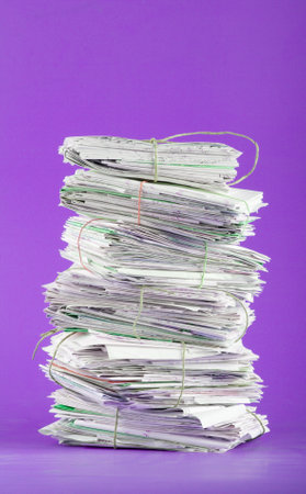 Tied up foot of briefs on a purple background.