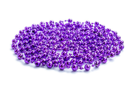 Christmas decoration beads on white background.の写真素材