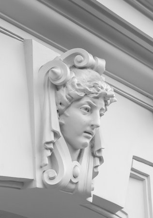 decorative statue of a woman on a building.の写真素材