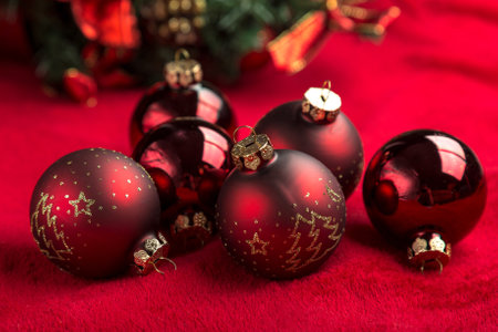 Red christmas balls on red background.の写真素材