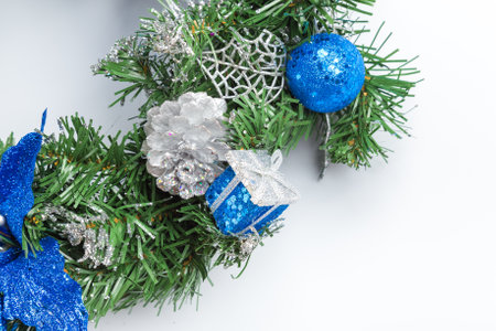 Christmas fir tree branch with golden decoration.の写真素材