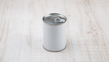 tin can on white wood background.