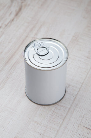 cans on wood floor and wood backgroundsの写真素材