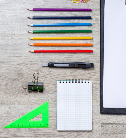 school supplies with pencils, paint pens paper scissors and rulers.の写真素材