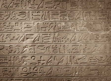 old egypt hieroglyphs carved on the stone.の写真素材