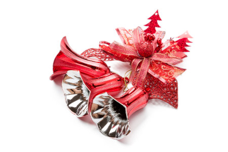 Red christmas bell decoration hanging on white background