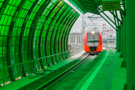 MOSCOW, RUSSIA - SEPTEMBER 13, 2016: Moscow Central Circle Line MCC (Moscow Ring Railway) Lastochka commuter train at the railway station Delovoj centrのeditorial素材