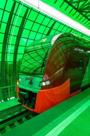 MOSCOW, RUSSIA - SEPTEMBER 13, 2016: Moscow Central Circle Line MCC (Moscow Ring Railway) Lastochka commuter train at the railway station Delovoj centrのeditorial素材