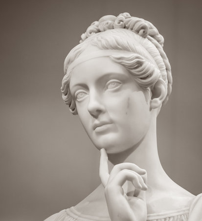 White marble head of young woman.の写真素材