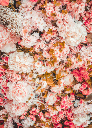 Vintage style faded natural flowers background.の写真素材