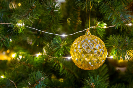 Christmas decorations on the branches of fir tree.の写真素材
